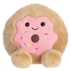 Palm Pals Claire Donut by Aurora. Featuring fluffy beige fur, glossy eyes, sweet smile, with little feet and embroidered icing and sprinkles. Claire Donut  fits into the palm of your hand, full of beans which makes it super soft and cuddly.