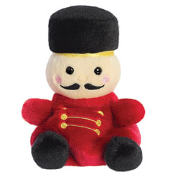 Aurora World Palm Pals Marius Nutcracker plush soft toy coming in a soft red plush body, with black boots, moustache and matching hat finished with a gold rim.