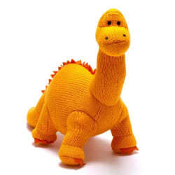 Best Years Orange Knitted Diplodocus Dinosaur. Made from 100% acrylic yarn with recycled polyester stuffing in a vibrant orange knitted fur. Featuring deep orange felt claws and spikes along the back, with hand stitched eyes.