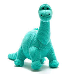 Best Years Diplodocus Knitted Dinosaur Toy - Ice Blue. Made From 100% acrylic yarn with recycled polyester stuffing in a knitted, ice blue fur. Featuring blue felt claws and spikes along the back, with hand stitched eyes.