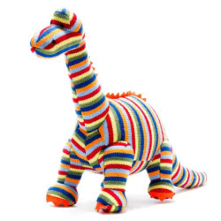 Best Years Diplodocus Knitted Dinosaur Soft Toy Rainbow Stripe. Made From 100% acrylic yarn with recycled polyester stuffing in a vibrant, multi-coloured knitted body. Featuring deep orange felt claws and soft spikes along it's back.