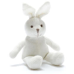 Best Years Knitted Cotton White Bunny Baby rattle. Made from 100% organic cotton knit with recycled polyester stuffing. Featuring a cute white rabbit, with upright ears, a stitched smiley face and a gentle rattle