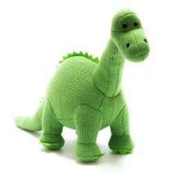 Best Years Green Diplodocus Knitted Dinosaur Soft Toy. Made from 100% acrylic yarn with recycled polyester stuffing in a vibrant, lime green knitted fur. With matching green felt claws and spikes along the back, finished off with hand stitched eyes.