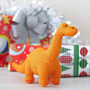 Best Years Diplodocus Knitted Dinosaur Rattle Orange Insitu