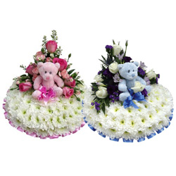 Baby Funeral Flower Tributes including Teddy Bears, Dummies, Prams, Posy Pads with Teddies, Posies and Bespoke Baby Floral Tributes.