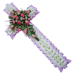 Flower Crosses are often used to adorn the coffin or casket, they come in five sizes ranging from 22 ins to six feet, often used as a prominent religious symbol.