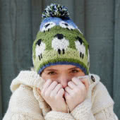 Pachamama Knitwear is all hand knitted in Nepal by local villagers using local wools and dyes to UK design. All Pachamama bobble beanies, beanies, handwarmer gloves, glove mitts, headbands, sofa socks, legwarmers, and long socks use 100% wool with fleece linings. They are all fairly traded.
