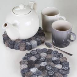 Pachamama Knitwear Trivets are hand felted, fairly traded made from 100% wool, used to protect surfaces from damage caused by hot saucepans & teapots.