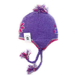 Pachamama Coniston Pastel Chullo. These hand knitted Pachamama Chullo hats are made from 100% wool with a fleece lining. Individually hand knitted with care. Every design is subtly different from the next.
