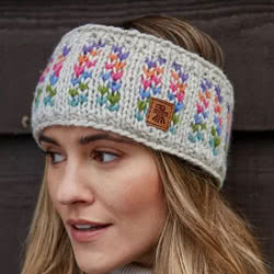 Pachamama Knitwear Andorra Oatmeal Headband ear warmer, features pastel fair-isle patterns on an oatmeal background, 100% Wool, fleece lined.
