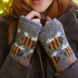 Pachamama Knitwear Beehive Bark Handwarmer fingerless gloves, featuring flying bees & hives, handknitted, 100% wool, fleece lined.