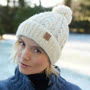 Pachamama Knitwear Chamonix Bobble Beanie Cream Hat wearing