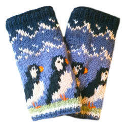 Pachamama Knitwear Circus of Puffins Handwarmer fingerless gloves, featuring puffins on a blue background, 100% wool, fleece lined.
