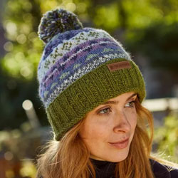Pachamama Classic Fairisle Roll Back Bobble Beanie Olive Hat features green roll back with patterned bands, 100% Wool, fleece lined