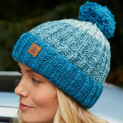 Pachamama Knitwear Cotopaxi Bobble Beanie Teal Hat features thick bands of teal, 100% Wool, fleece lined