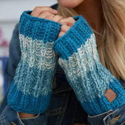 Pachamama Knitwear Cotopaxi Handwarmer Teal fingerless gloves, featuring shades of teal in thick bands, 100% wool, fleece lined.