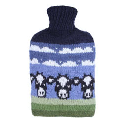 Pachamama Dairy Cow Hot Water Bottle. This cute 
bottle cover comes with a Friesian dairy cow and scudding clouds pattern. They are knitted in Nepal
using local wools and natural dyes. Every design is subtly different from the next.