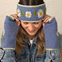 Pachamama Knitwear Daisy Chain Handwarmer Jacaranda underneath