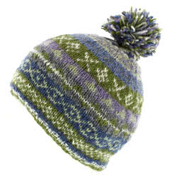 Pachamama Finisterre Bobble Beanie Olive hat, features an olive and purple pattern with a Sherpa fleece lining. The colours will always be the same but the patterns sequence may change slightly.