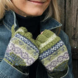 Pachamama Classic Fairisle Glove Mitts in Olive. These 100% wool fine knit convertible fingerless mittens feature a series of simple Fair Isle patterns, which may vary from piece to piece. Close the flap to keep your fingers warm. Or, fasten back the flap