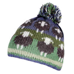 Pachamama Knitwear Flock of Herdwick Sheep Bobble Beanie hat featuring Herdwick sheep on green & blue background, 100% wool, fleece lined