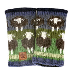Pachamama Knitwear Flock of Herdwick Sheep Handwarmer fingerless gloves, features black sheep on a blue & green background, 100% wool.