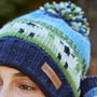Pachamama Knitwear Flock of Sheep Roll Back Bobble Beanie Hat close