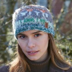 Pachamama Knitwear Hazy Herdi Headband featuring a black sheep animal pattern with warm autumnal colours, 100% wool.