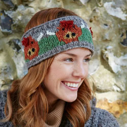 Pachamama Knitwear Herd of Highland Cow Headband ear warmers features a row of Highland Cows, 100% Wool, fleece lined.