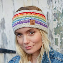 Pachamama Knitwear Hexham Headband Oatmeal ear warmer, features colourful rainbow stripes on an oatmeal background, 100% Wool, fleece lined.
