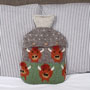 Pachamama Knitwear Highland Cow Hot Water Bottle in-situ
