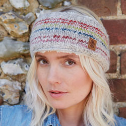 Pachamama Knitwear Langtang Headband Multi featuring colourful rainbow stripes on an oatmeal background, 100% Wool, fleece lined.