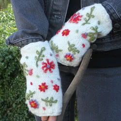 Pachamama Knitwear Lugano Handwarmer Cream fingerless gloves, feature intricate hand embroidered flowers, 100% wool, fleece lining.