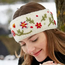 Pachamama Knitwear Lugano Headband Cream ear warmer, features hand embroidered flowers on a cream background, 100% Wool, fleece lined.