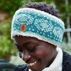 Pachamama Knitwear Pentle Bay Headband ear warmers featuring a teal and white floral fair isle pattern, 100% wool, fleece lined.