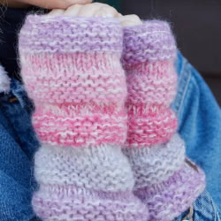 Pachamama Knitwear Sierra Nevada Handwarmer Pink, hand knitted in a wool and mohair blend, lined with sherpa fleece. 