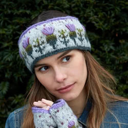 Pachamama Knitwear Thistle Headband ear warmers, featuring hand embroidered thistles on a grey background, 100% wool, fleece lined.