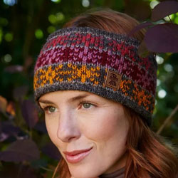 Pachamama Knitwear Tintagel Fine Knit Headband ear warmers, featuring a striped sun and stars pattern, hand-knitted, 100% wool, fleece lined.