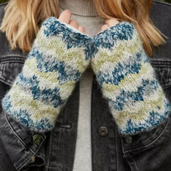 Pachamama Knitwear Totnes Handwarmer Spruce fingerless gloves featuring teal, cream & green Fair-Isle pattern, handknitted, wool-mohair blend, fleece lined.