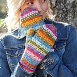 Pachamama Knitwear Villarica Lined Mittens, hand-knitted, made from 100% wool with a fleece lining, the design features brightly coloured dotty stripes.
