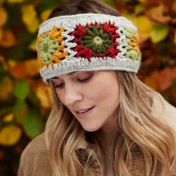 Pachamama Knitwear Woodstock Oatmeal Headband ear warmers, featuring large flowers in earthy tones on an oatmeal background, 100% wool, fleece lined.