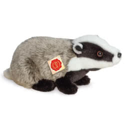 Teddy Hermann soft toy Badger 30cm. Featuring a speckled grey fur body, button nose and a very realistic black and white striped face.