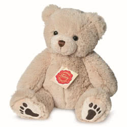 Introducing Teddy Hermann soft toy Beige Teddy Bear with Paws in a 23 cm size. Coming with a beige fur body, classic cupped ears, perfect proportions, and comes with the most adorable, cute looks. Finished with the teddy footprints.