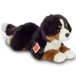 Introducing Teddy Hermann  lying Bernese Mountain Dog soft toy in a 40cm size. Coming with a black, ginger and white fur body, floppy ears and perfect proportions. Filled with 100% recycled polyester.