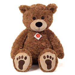 Introducing Teddy Hermann soft toy Brown Teddy Bear with Paws in a 55 cm size. Coming in a rich brown, ruffled fur body with a cute smiley face and the classic footprint soles.