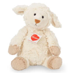 Teddy Hermann Maggi Sheep 27cm soft toy coming with ruffled cream fur, beige hoofs and an adorable smile, part of the Teddy Hermann 'Herzekind' collection