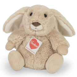 Teddy Hermann Polli Beige Bunny 15cm plush soft toy coming in a pale-beige fur body with lined ears, a small bobtail, long flexible ears, a dark-brown nose and black safety eyes..Polli has a rounded shape, and comes with the most adorable looks.