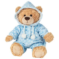 Teddy Hermann Blue Pyjama Teddy Bear soft toy in a 30 cm size. Coming in a rich caramel brown, ruffled fur body with a dark brown button nose and comes wearing hooded blue pyjamas with white spots and little pom-poms.
