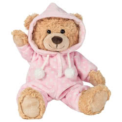 Teddy Hermann Pink Pyjama Teddy Bear soft toy in a 30 cm size. Coming in a rich caramel brown, ruffled fur body with a dark brown button nose and comes wearing hooded pink pyjamas with white spots and little pom-poms.