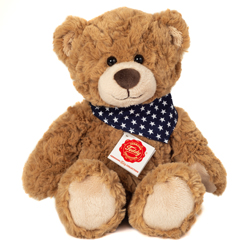 Teddy Hermann Rufus Teddy Bear soft toy in a 30 cm size. Made From cotton and polyester. Rufus comes in a rich caramel brown, ruffled fur body with light tan pads and matching muzzle, finished off with a tasteful star covered neckerchief.